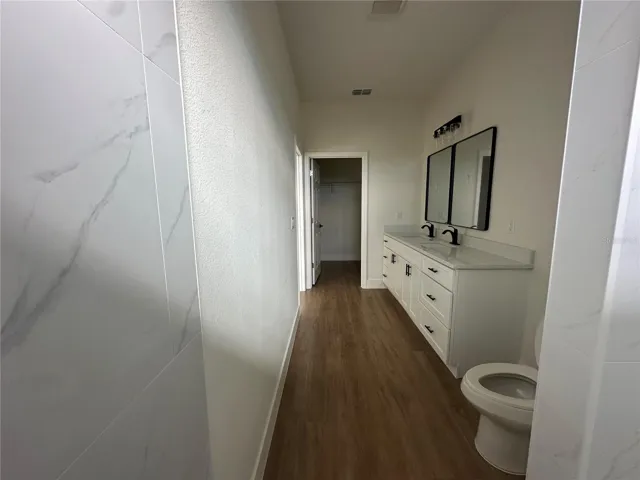 MAIN ROOM | Master Shower + Walk-in Closet