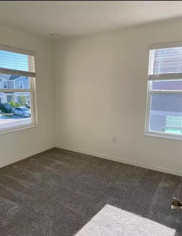 “Third bedroom offering comfort, natural light, and flexibility.”