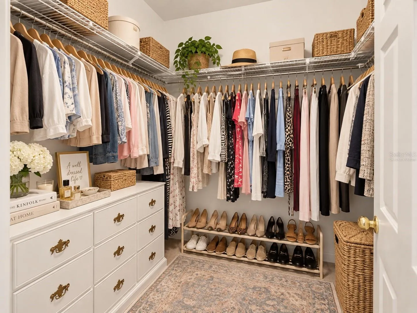 Primary spacious walk-in closet, virtually staged
