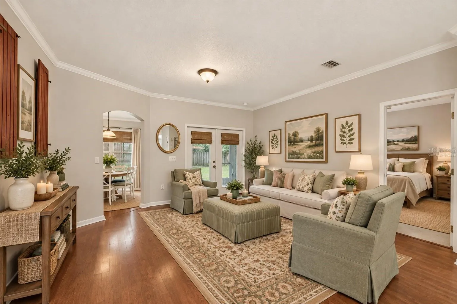 Virtually staged living room off kitchen