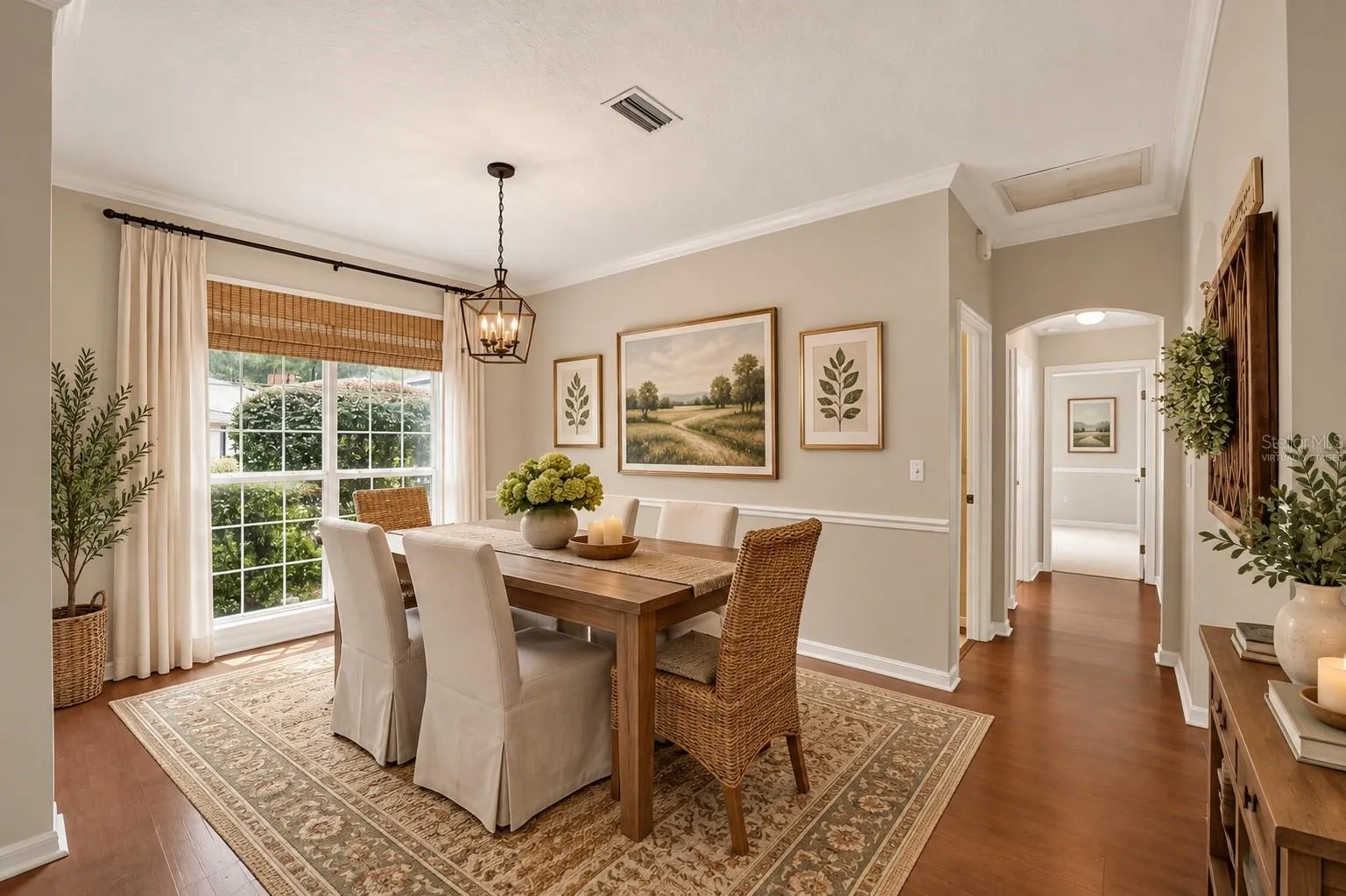 Dining room off foyer, virtually staged