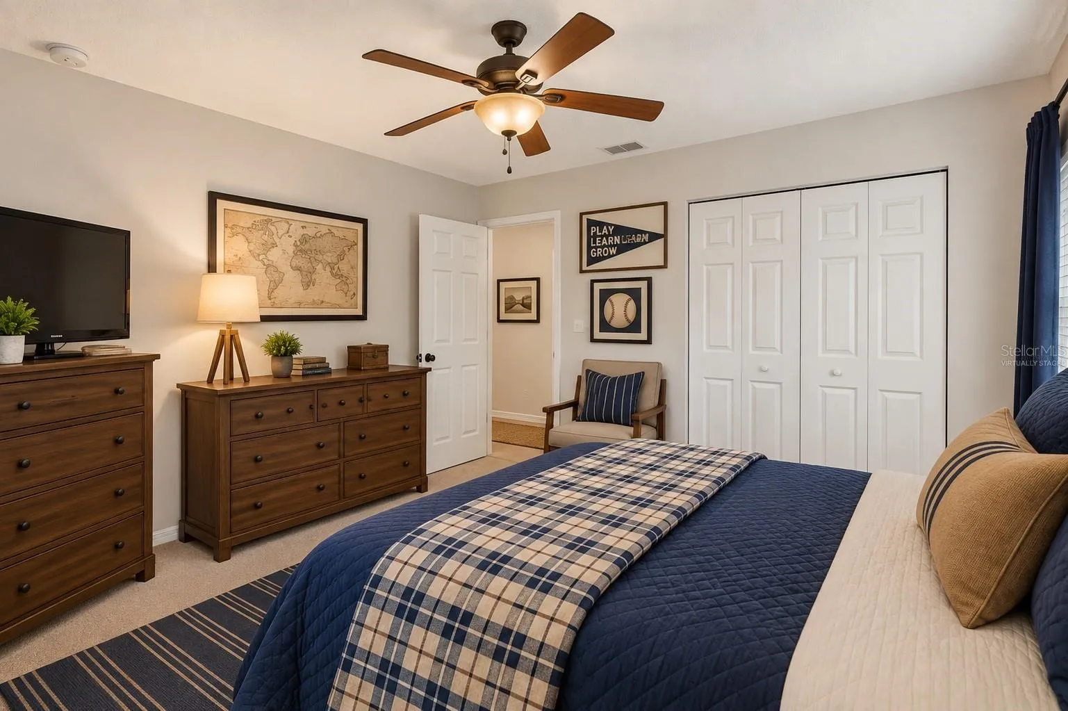 One of three large secondary bedrooms in 3-way split configuration, virtually staged