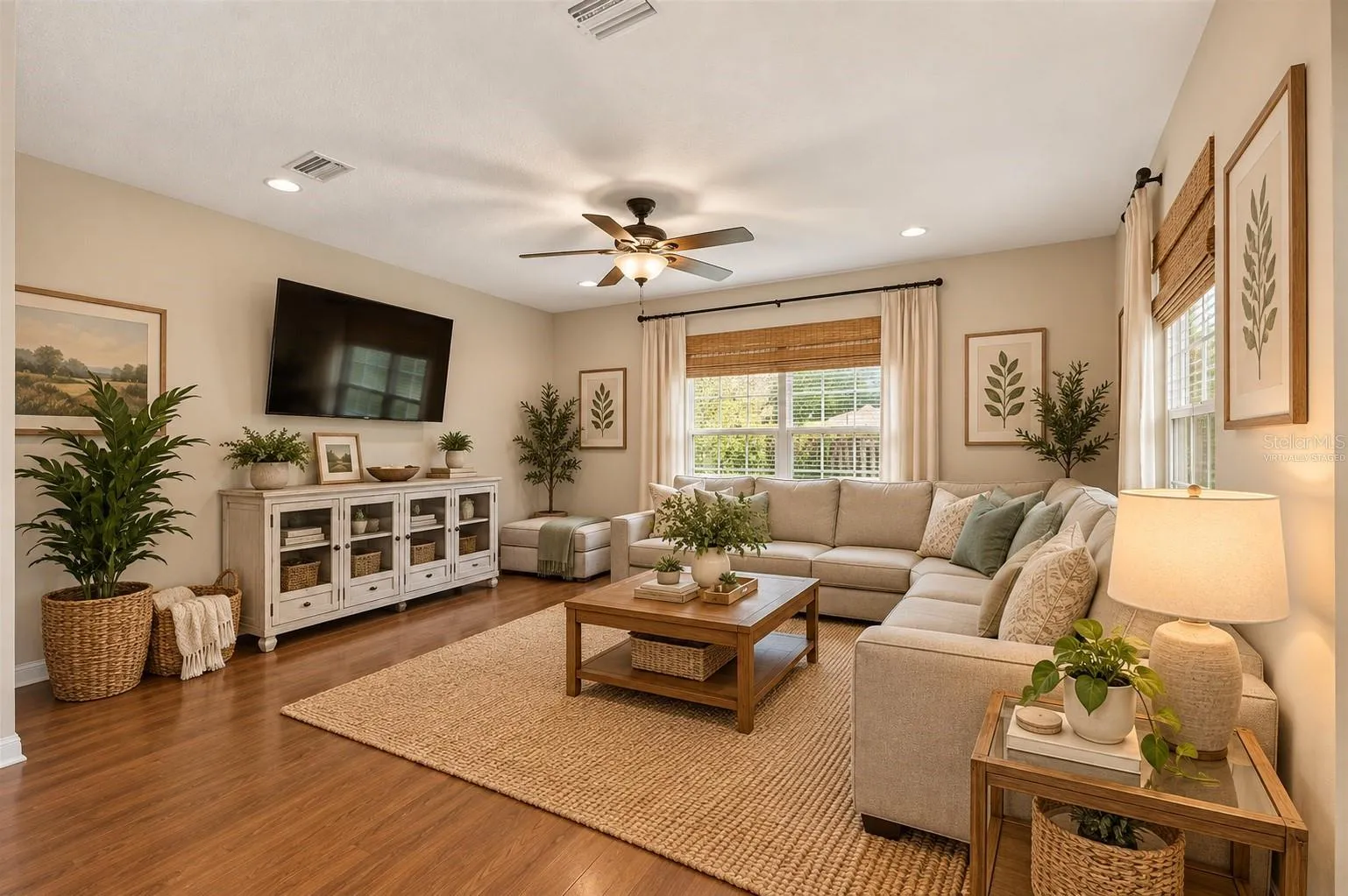 Virtually staged family room off kitchen with views of backyard