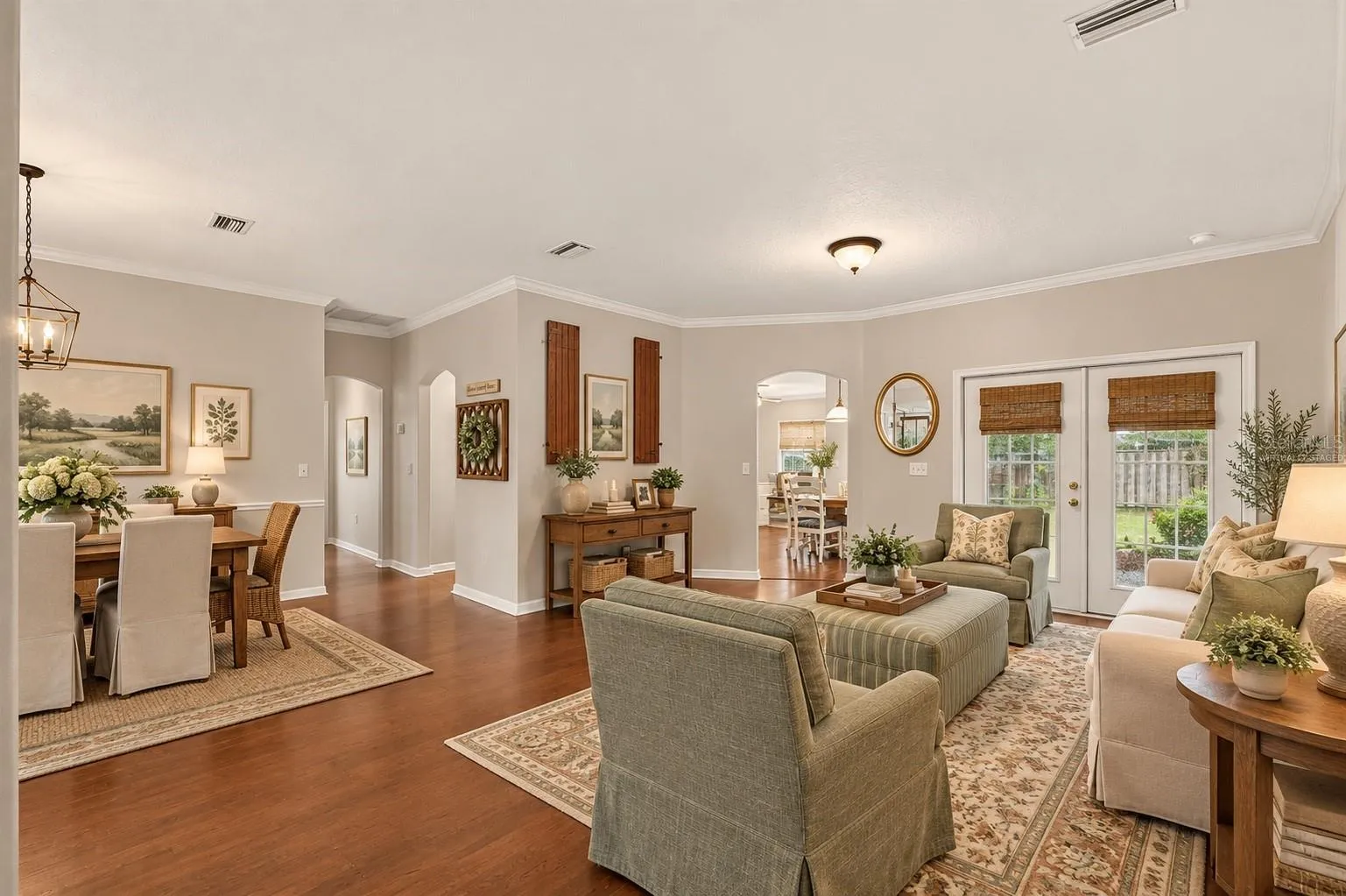 Virtually staged living room off kitchen