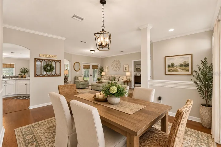 Dining room off foyer, virtually staged