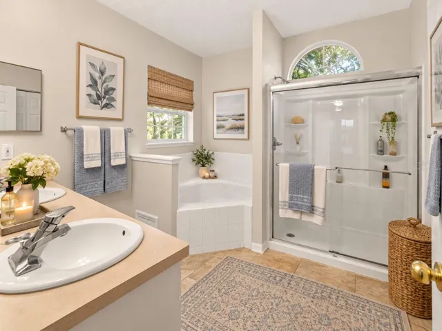 Light and bright primary bathroom, virtually staged