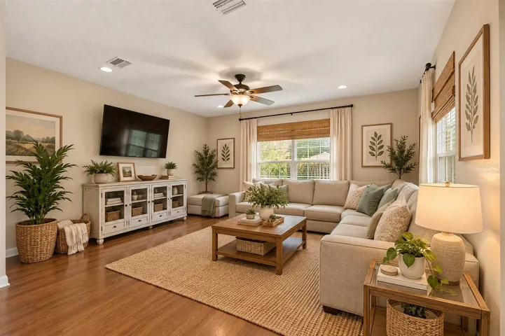 Virtually staged family room off kitchen with views of backyard