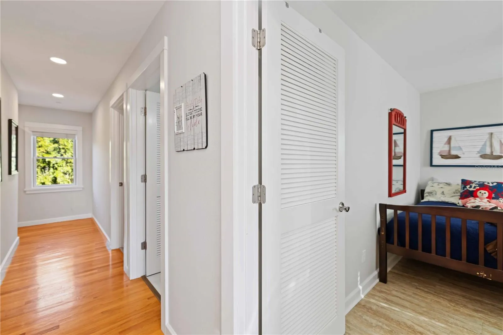 Hallway between bedrooms 2 &amp; 3 and main level full bath