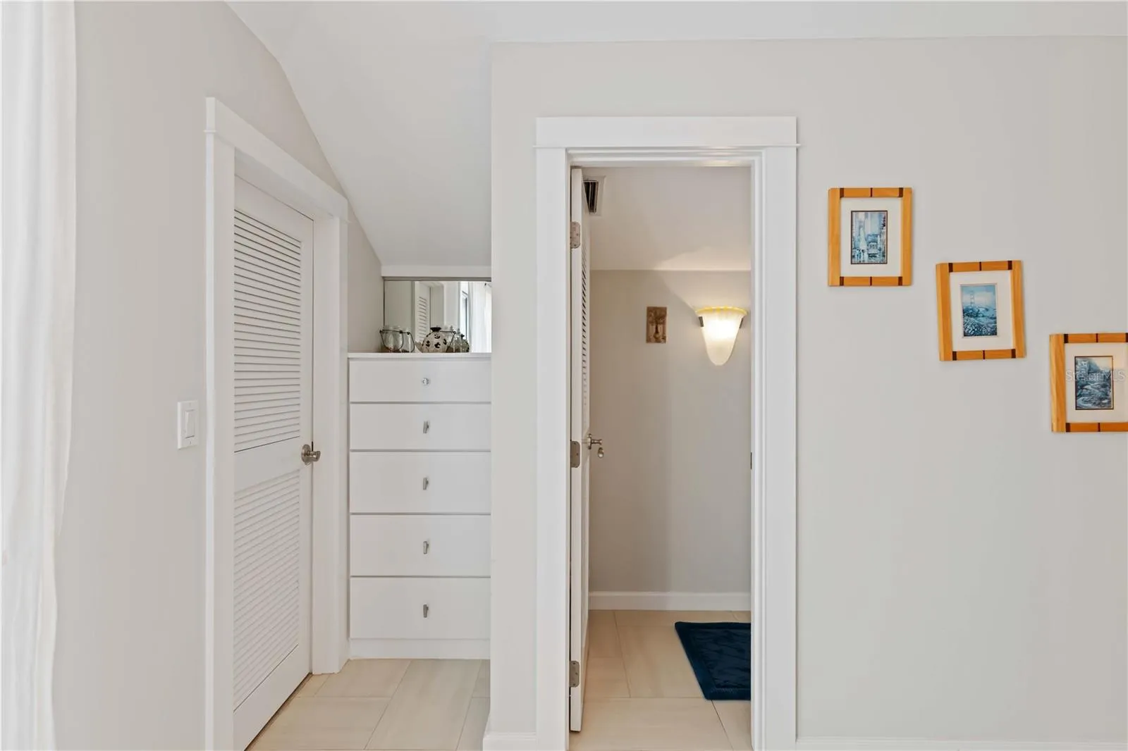 Primary suite with water closet and built in storage