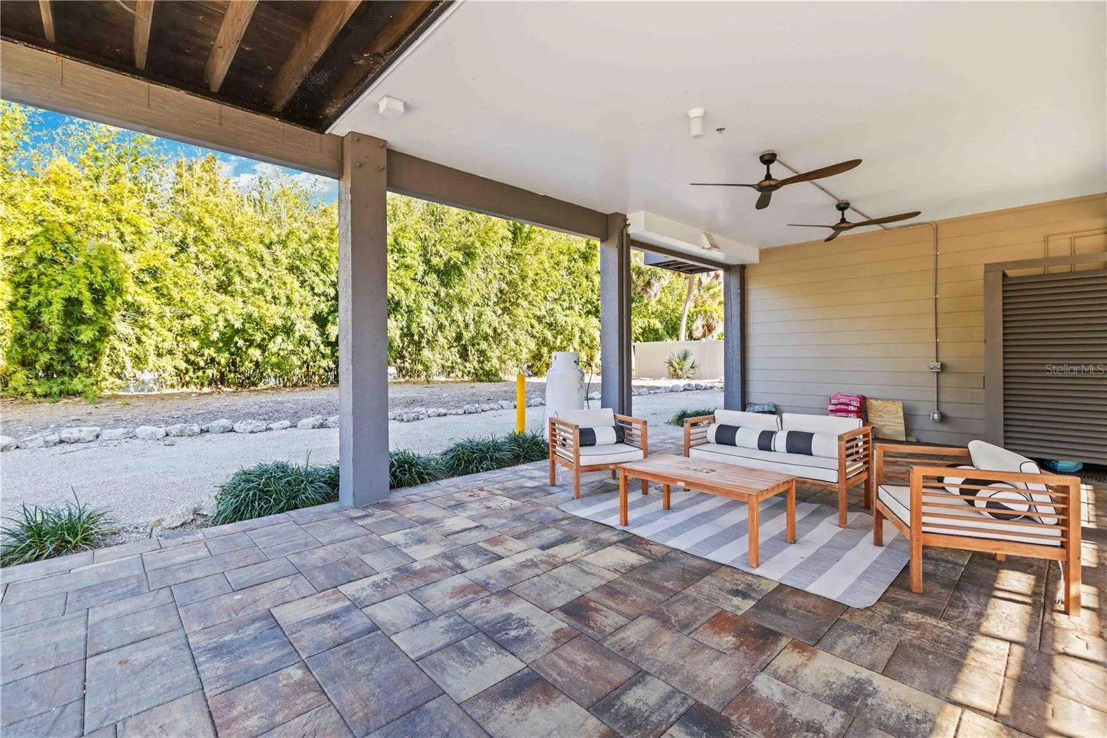 Paver brick under home entertaining area w outdoor shower