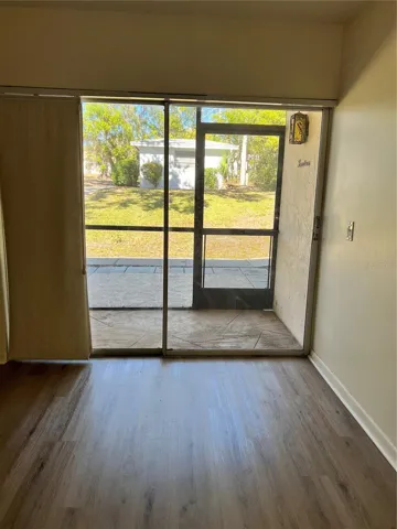 Screened back porch access from primary bedroom