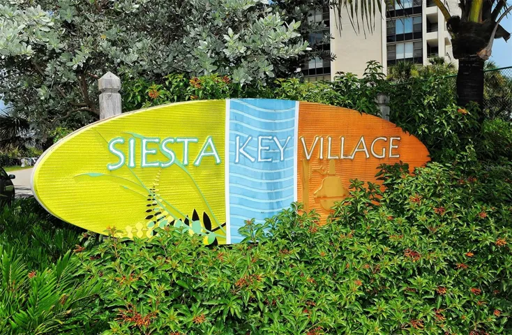 Whispering Sands is ideally located around the corner from the shops and restaurants of Siesta Key Village.