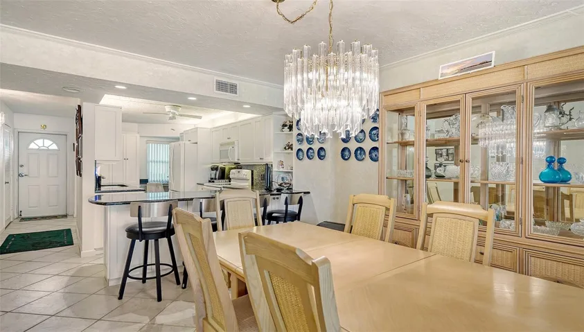 View of dining space and open kitchen.