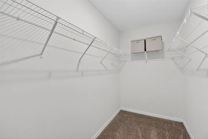 Large walk-in closet in Primary Bedroom