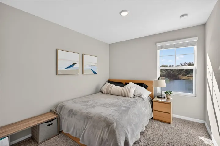 Second Bedroom with window overlooking pond