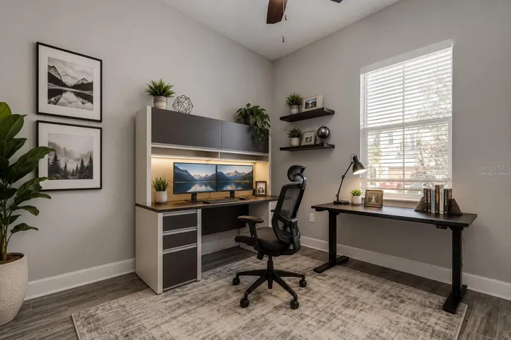 Virtually staged bedroom as an office.