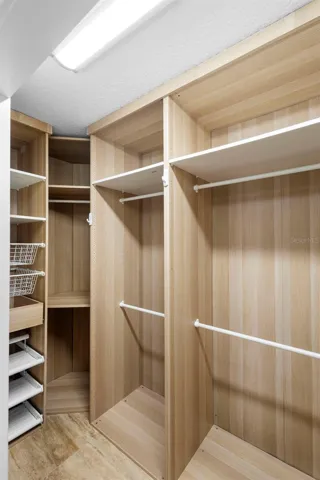 WALK-IN CLOSET WITH ORGANIZATION SHELVES