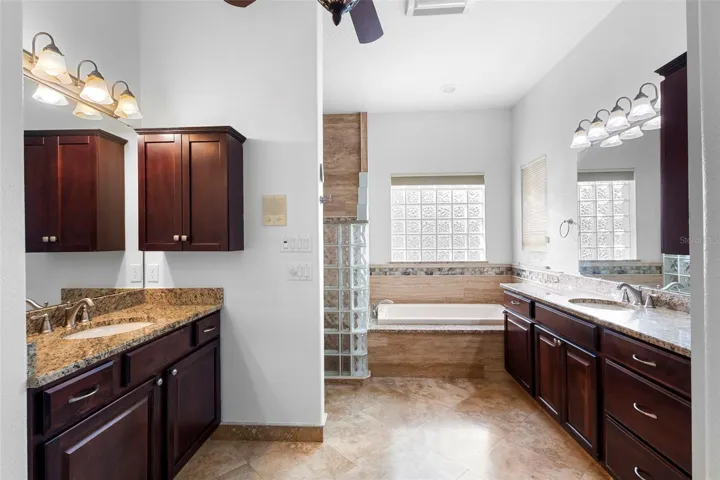 PRIMARY BATHROOM WITH TRAVERTINE FLOOR