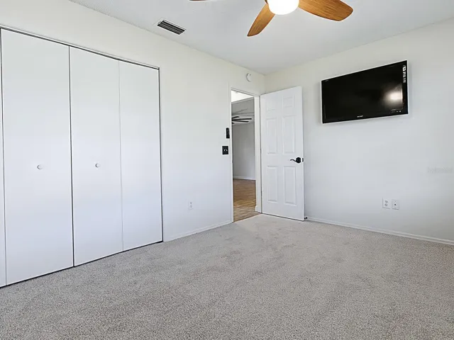 2nd Bedroom with TV and brand new carpet