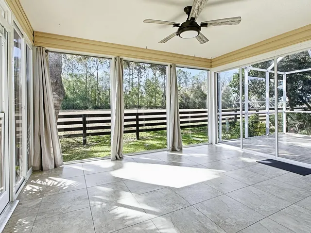 Glass Enclosed Lanai with a peaceful preserve view.