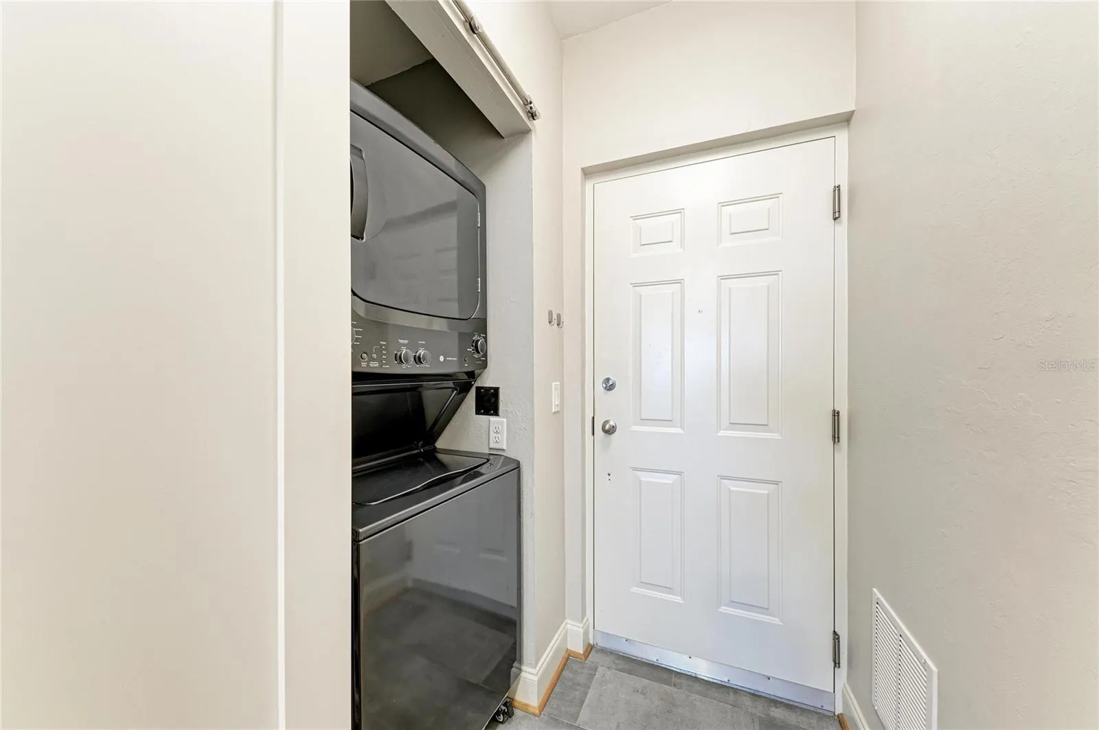 Laundry with stylish barn door access