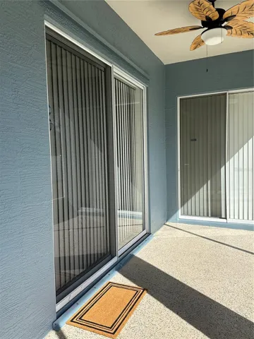 Back Patio with Sliding Glass Door to Master Bedroom
