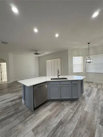Kitchen Island with Pop-Up Outlet