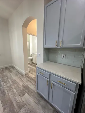 Kitchen Cabinets and Beautiful Archway