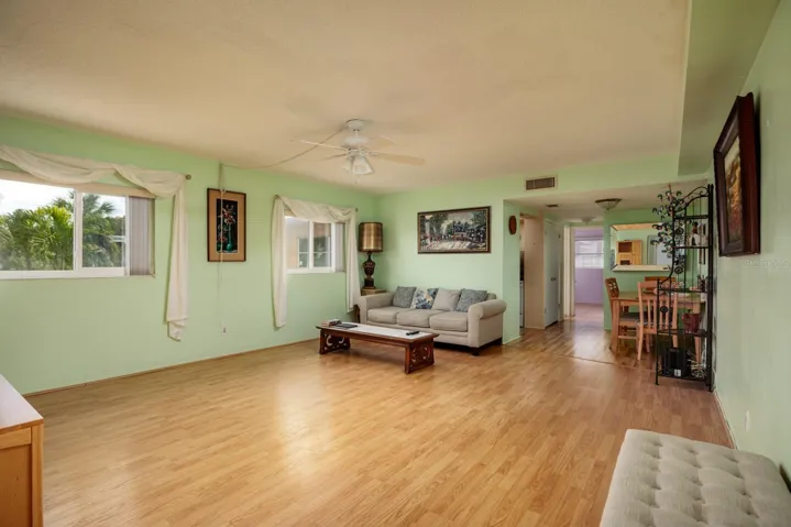 Living/Dining rooms. Laminate flooring over original terrazzo flooring.