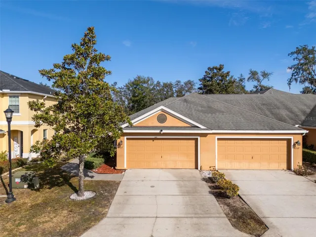 Updated villa in gated Lexington Commons with 2-car garage