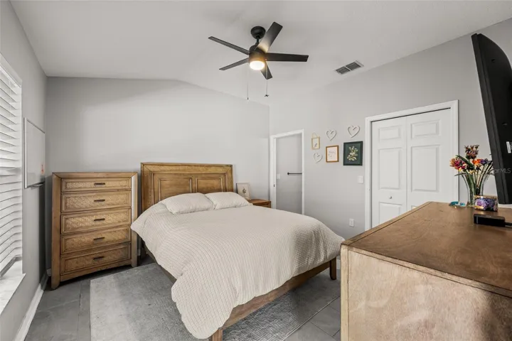 Spacious primary bedroom with private en-suite bath