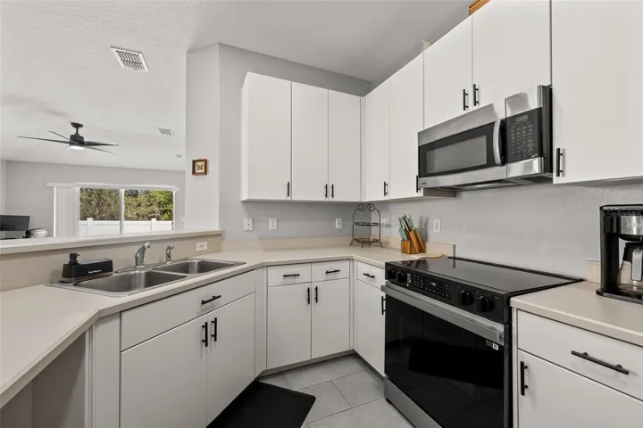 Updated kitchen with stainless-steel appliances