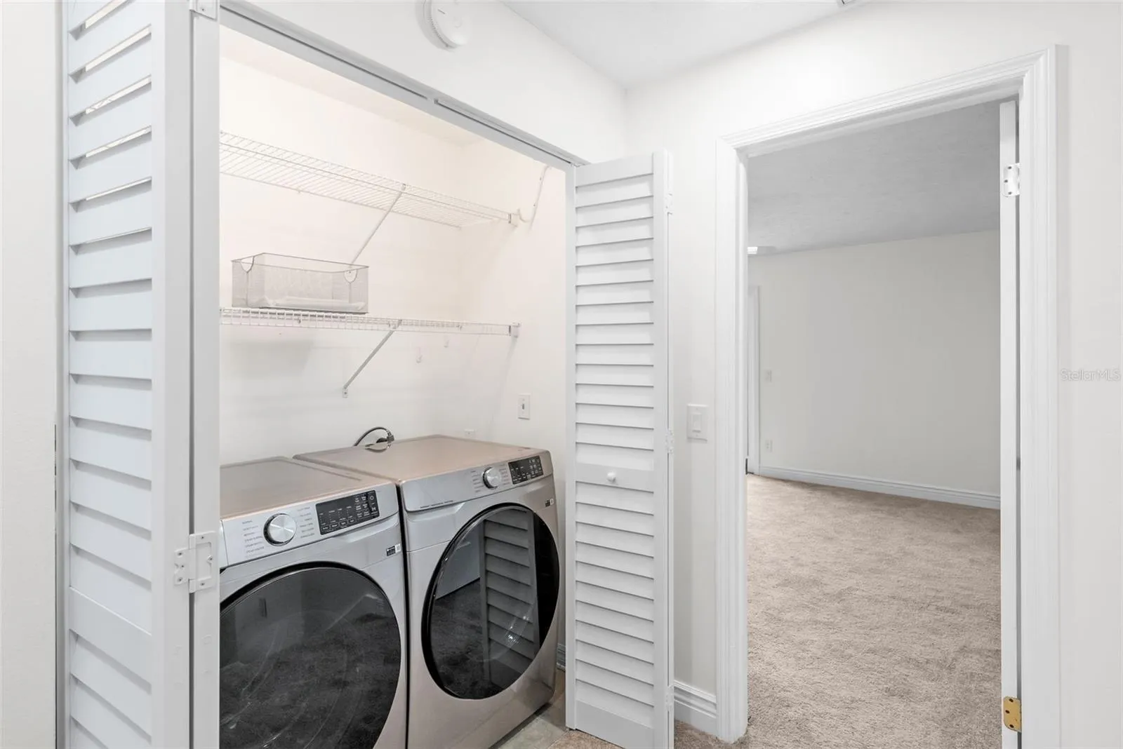 Upstairs laundry with brand new full-sized front load washer & dryer included!