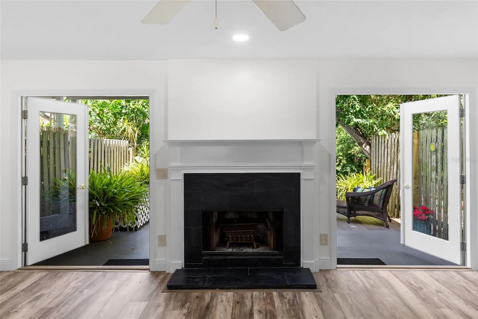 Beautiful doors open to the private patio!