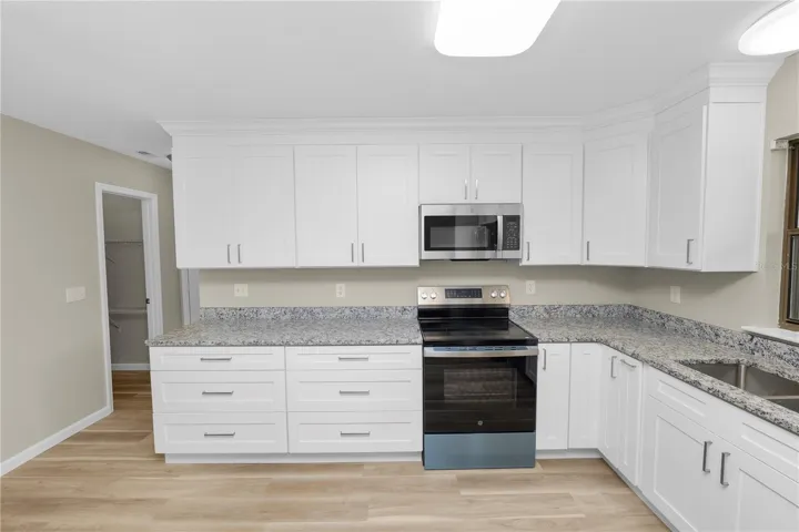 The door you see to the left is a Walk In Pantry.