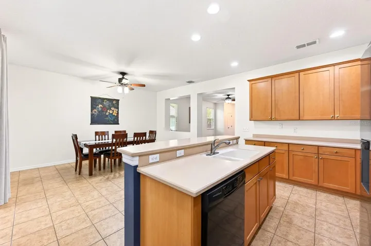 Kitchen is open to the spacious dining area.