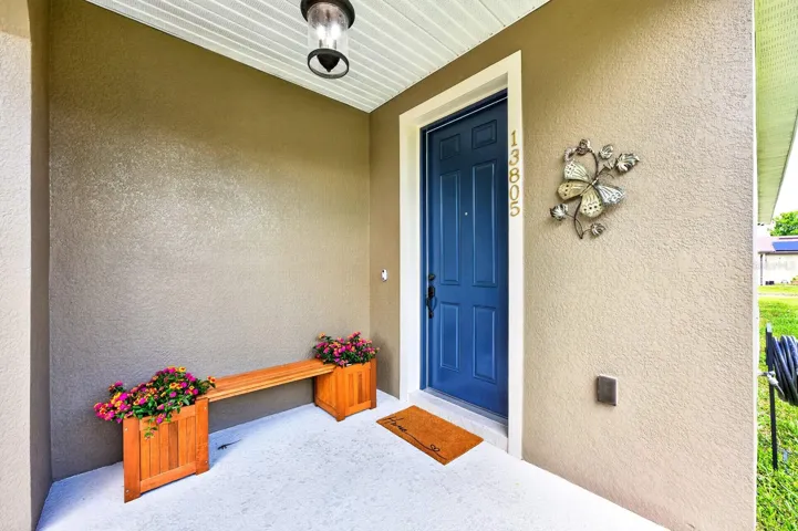 Covered front porch welcomes you home.