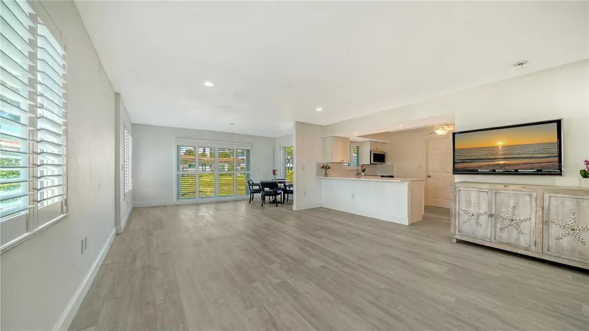 New Custom White Plantation Shutters on Every Window and Sliding Door in the Great Room and Kitchen!