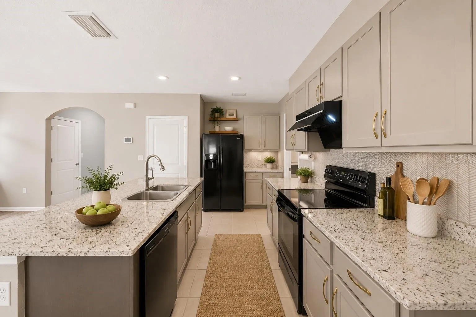 Virtually staged to showcase an alternative kitchen color package.