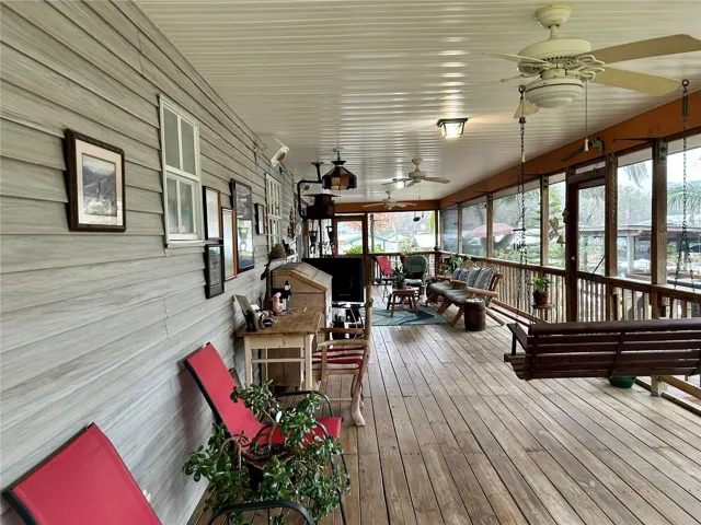 55730 Holiday Cir Canalside Scrn Porch Looking Towards Swing