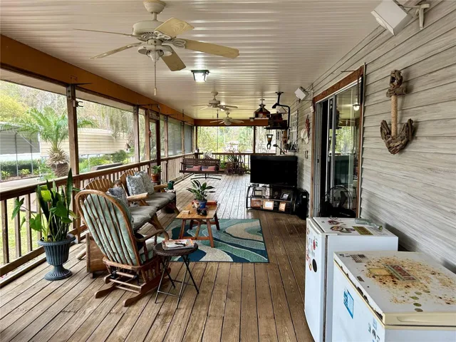 55730 Holiday Cir Canalside Scrn Pch Looking Towards Holiday Rd