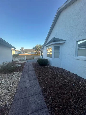 Side yard looking to backyard