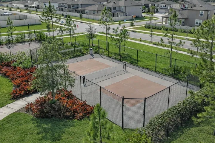 Amenities include a swimming pool, clubhouse, picnic areas, dog park, playground, basketball courts, and pickleball courts.