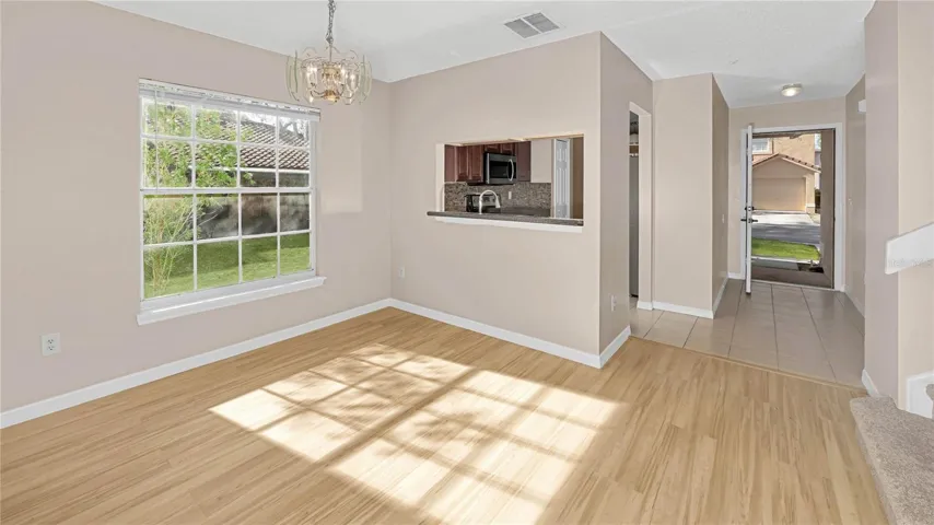 View from Back Patio looking towards Living Room, Dining Room and then Eat-In Kitchen!
