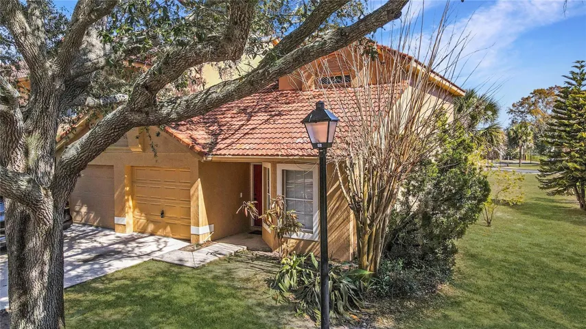Well-Priced & ~Just-RE-MODELED~  THREE-Bedroom, Two-Bath, Two-Story, End-Unit TOWNHOME with a GARAGE Just Steps from the Community Pool in Errol Estates! HOLY COW!