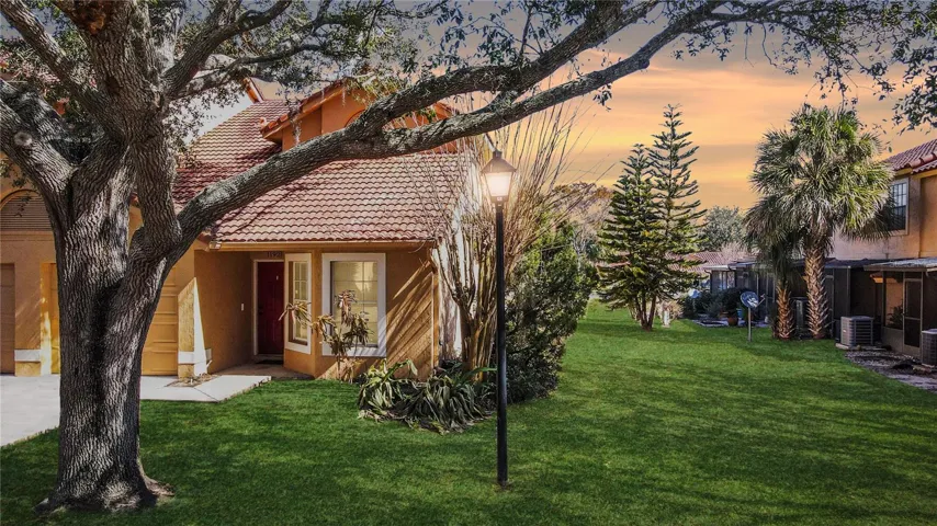 Well-Priced & ~Just-RE-MODELED~  THREE-Bedroom, Two-Bath, Two-Story, End-Unit TOWNHOME with a GARAGE Just Steps from the Community Pool in Errol Estates! HOLY COW!