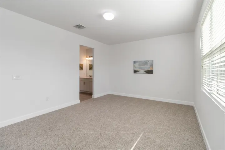 Primary Bedroom with new carpeting