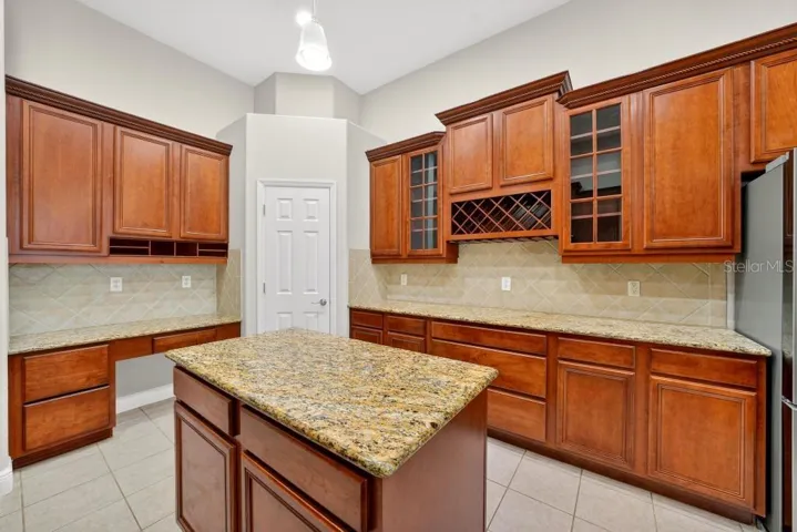 Solid Wood cabinets, New Stainless Appliances, Granite Counter Tops, Large Pantry and an Island