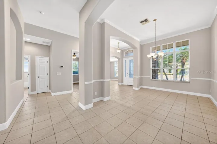 Dining Room looking towards the Bonus Room, an Extra Bedroom or other Office/Work Space and Guest Bath
