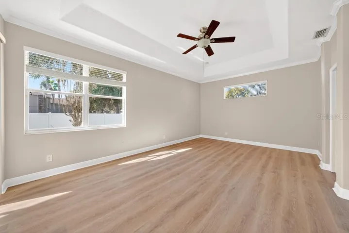 Large Mainfloor Primary Bedroom with Dual Closets and Large Bath - Sliding Doors to Screened Porch